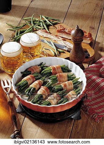 Stock Image - Green beans with bacon and vegetables, Luxembourg, Europe. Fotosearch