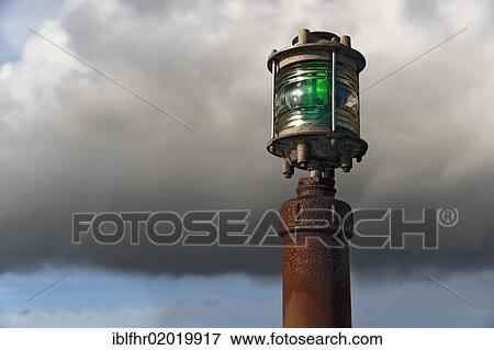 Green breakwater light on a harbour entrance, Harboelle, Moen, Denmark, Europe View Large Photo Image Stock Photo - Green breakwater light on a harbour entrance, Harboelle, Moen, Denmark, Europe. Fotosearch