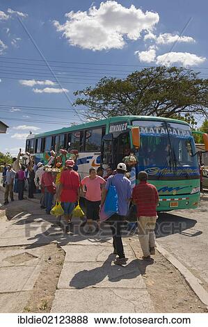 Greengrocers offering their wares to bus travellers, Sébaco, Nicaragua, Central America, North America View Large Photo Image Stock Photo - Greengrocers offering their wares to bus travellers, Sébaco, Nicaragua, Central America, North America. Fotosearch