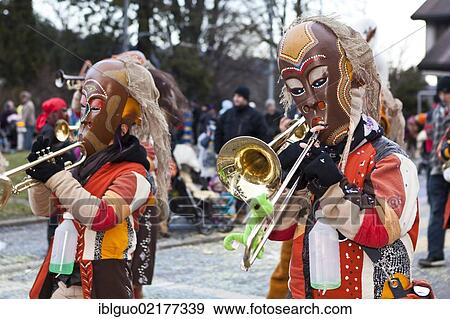 Guggen music band dressed up as indigenous Australians, Aborigines, 35th Motteri-Umzug parade in Malters, Lucerne, Switzerland, Europe View Large Photo Image Stock Photo - Guggen music band dressed up as indigenous Australians, Aborigines, 35th Motteri-Umzug parade in Malters, Lucerne, Switzerland, Europe. Fotosearch