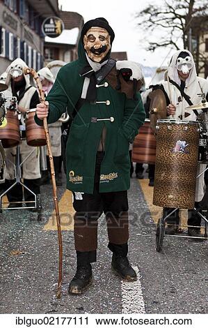 Guggen music, drum major dressed up as a shepherd, 35th Motteri-Umzug parade in Malters, Lucerne, Switzerland, Europe View Large Photo Image Stock Image - Guggen music, drum major dressed up as a shepherd, 35th Motteri-Umzug parade in Malters, Lucerne, Switzerland, Europe. Fotosearch
