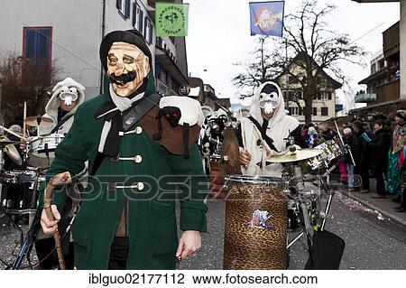 Stock Image - Guggen music, drum major dressed up as a shepherd, 35th Motteri-Umzug parade in Malters, Lucerne, Switzerland, Europe. Fotosearch