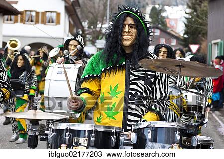 Guggenmusik group, carnival marching band, in costume for "Jamaican safari", 35th Motteri Parade, Malters, Lucerne, Switzerland, Europe View Large Photo Image Stock Image - Guggenmusik group, carnival marching band, in costume for "Jamaican safari", 35th Motteri Parade, Malters, Lucerne, Switzerland, Europe. Fotosearch