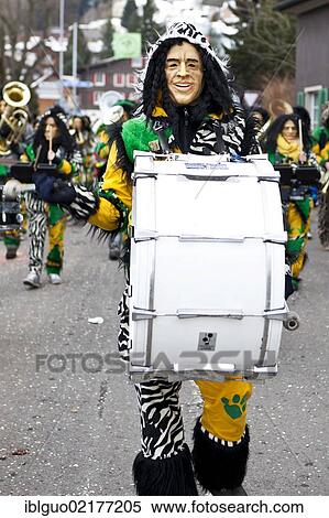 Guggenmusik group, carnival marching band, in costume for "Jamaican safari", 35th Motteri Parade, Malters, Lucerne, Switzerland, Europe View Large Photo Image Stock Photography - Guggenmusik group, carnival marching band, in costume for "Jamaican safari", 35th Motteri Parade, Malters, Lucerne, Switzerland, Europe. Fotosearch