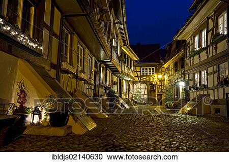 Stock Image - Half-timbered houses, cobbled streets at night, Gengenbach, Black Forest, Baden-Wuerttemberg, Germany, Europe. Fotosearch