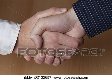 Hand in hand, young couple, young woman, 27, and a young man, 23 View Large Photo Image Stock Photo - Hand in hand, young couple, young woman, 27, and a young man, 23. Fotosearch