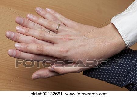 Hands with wedding rings, young woman, 27, and a young man, 23 View Large Photo Image Stock Image - Hands with wedding rings, young woman, 27, and a young man, 23. Fotosearch