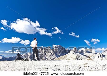 Hiker on Drei Zinnen Trail, Tre Cime di Lavaredo, Dolomites, Italy, Europe View Large Photo Image Stock Photography - Hiker on Drei Zinnen Trail, Tre Cime di Lavaredo, Dolomites, Italy, Europe. Fotosearch