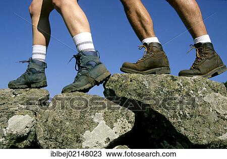 Stock Image - Hikers' legs, walking in the Massif of Sancy, Puy de Dome, Auvergne, France, Europe. Fotosearch