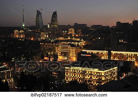 Historic city centre of Baku, dusk, UNESCO World Heritage Site, with the high-rise towers of the three Flame Towers, the new landmark of the city, and the TV Tower, Baku, Azerbaijan, Caucasus, Middle East, Asia View Large Photo Image Stock Photo - Historic city centre of Baku, dusk, UNESCO World Heritage Site, with the high-rise towers of the three Flame Towers, the new landmark of the city, and the TV Tower, Baku, Azerbaijan, Caucasus, Middle East, Asia. Fotosearch
