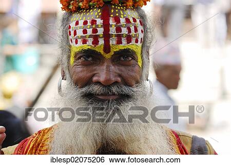 Holy man, Sadhu, with a painted face and a long beard, Durbar Square, Kathmandu, Nepal, Asia View Large Photo Image Stock Photograph - Holy man, Sadhu, with a painted face and a long beard, Durbar Square, Kathmandu, Nepal, Asia. Fotosearch