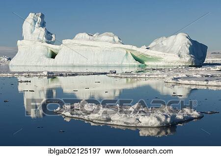 Stock Photo - Ice floe and iceberg, Weddell Sea, Antarctica. Fotosearch