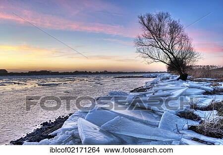 Ice on the banks of the Elbe river in winter, Kirchwerder, Vier- und Marschlande landscape, Hamburg, Germany, Europe View Large Photo Image Picture - Ice on the banks of the Elbe river in winter, Kirchwerder, Vier- und Marschlande landscape, Hamburg, Germany, Europe. Fotosearch