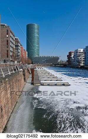 Ice on the Main River in Frankfurt's West Harbour, looking towards Westhafen Tower, nicknamed Apple Wine Tower after the shape of a typical Frankfurtian cider glass, Frankfurt am Main, Hesse, Germany, Europe View Large Photo Image Stock Image - Ice on the Main River in Frankfurt's West Harbour, looking towards Westhafen Tower, nicknamed Apple Wine Tower after the shape of a typical Frankfurtian cider glass, Frankfurt am Main, Hesse, Germany, Europe. Fotosearch