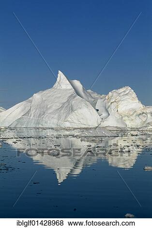 Stock Photo - Icebergs with reflection in the Kangia Ice Fjord, Ilulissat, Jabobshavn, Greenland, North America. Fotosearch