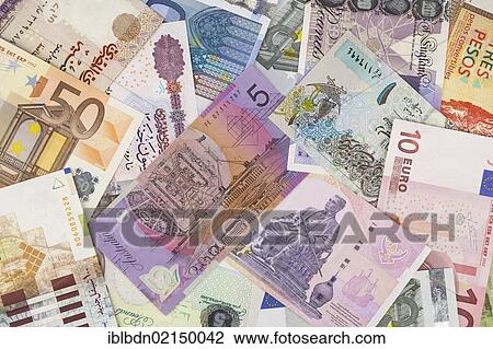 Stock Image - International currency banknotes. Fotosearch