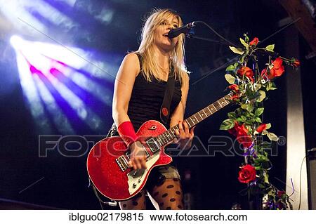 Stock Photography - Isabella Eder, guitarist of the Swiss band Delilah, performing live in the Schueuer concert hall, Lucerne, Switzerland, Europe. Fotosearch