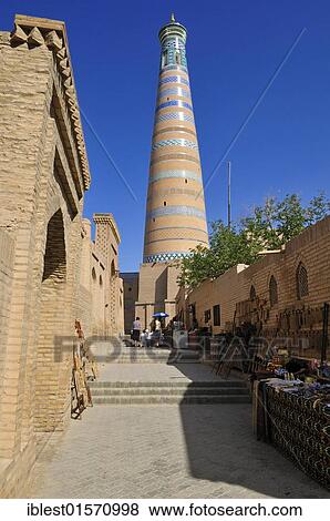 Islam Khodja or Islom Xoja Minaret in the historic adobe town of Khiva, Chiva, Ichan Kala, Silk Road, Unesco World Heritage Site, Uzbekistan, Central Asia, Asia View Large Photo Image Stock Photo - Islam Khodja or Islom Xoja Minaret in the historic adobe town of Khiva, Chiva, Ichan Kala, Silk Road, Unesco World Heritage Site, Uzbekistan, Central Asia, Asia. Fotosearch