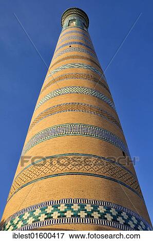 Islam Khodja or Islom Xoja Minaret in the historic adobe town of Khiva, Chiva, Ichan Kala, Silk Road, Unesco World Heritage Site, Uzbekistan, Central Asia, Asia View Large Photo Image Stock Photo - Islam Khodja or Islom Xoja Minaret in the historic adobe town of Khiva, Chiva, Ichan Kala, Silk Road, Unesco World Heritage Site, Uzbekistan, Central Asia, Asia. Fotosearch