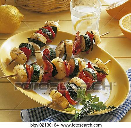 Picture - Israeli potato-vegetable skewers, potatoes, onions, courgettes and peppers, spicy seasoning, crispy grilled, Israel, Asia. Fotosearch