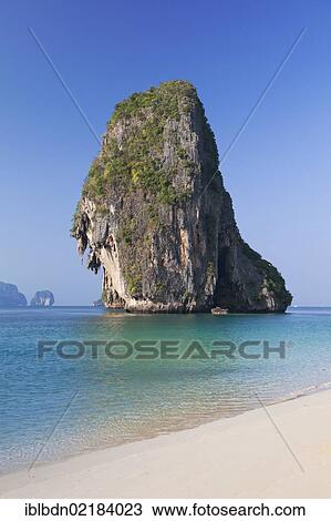 Karst rock formation off Laem Phra Nang beach, Krabi province, Thailand, Asia View Large Photo Image Stock Image - Karst rock formation off Laem Phra Nang beach, Krabi province, Thailand, Asia. Fotosearch