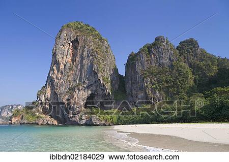 Karst rock formation off Laem Phra Nang beach, Krabi province, Thailand, Asia View Large Photo Image Stock Photo - Karst rock formation off Laem Phra Nang beach, Krabi province, Thailand, Asia. Fotosearch