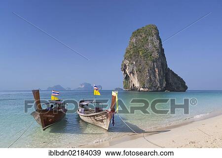 Karst rock formation off Laem Phra Nang beach, Krabi province, Thailand, Asia View Large Photo Image Stock Photo - Karst rock formation off Laem Phra Nang beach, Krabi province, Thailand, Asia. Fotosearch