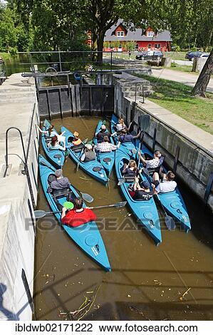 Kayaks, canal, Spree river, in Burg, Spreewald, Brandenburg, Germany, Europe View Large Photo Image Stock Image - Kayaks, canal, Spree river, in Burg, Spreewald, Brandenburg, Germany, Europe. Fotosearch