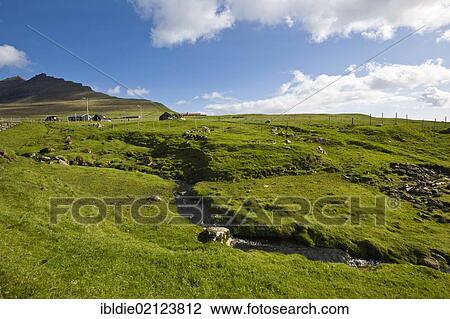Stock Image - Landscape with a farm in Viðareiði, on the island of Viðoy, Faroe Islands, island group in the North Atlantic, Denmark, Northern Europe, Europe. Fotosearch