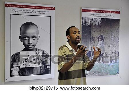 Stock Photography - Local leader at the memorial for the Belgian peacekeeping soldiers murdered in April 1994 in Kigali, Rwanda, Africa. Fotosearch
