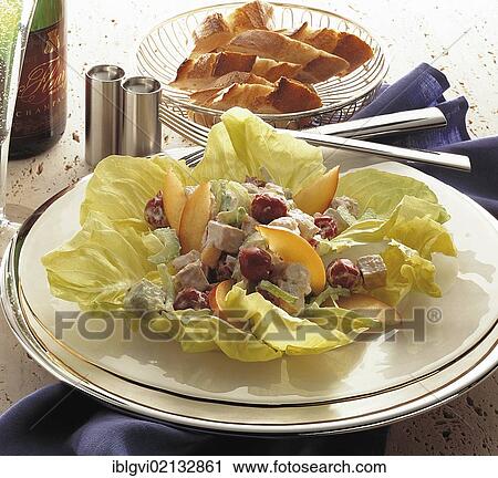 Stock Image - Lorraine poultry salad, with nectarines, cherries, chicken, celery and onions, France, Europe. Fotosearch