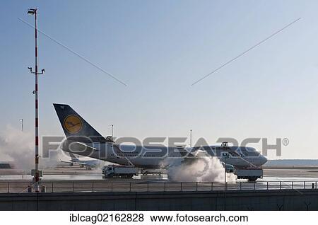 Lufthansa Boeing 747-430M being de-iced at Frankfurt Airport, Hesse, Germany, Europe, PublicGround, Europe View Large Photo Image Stock Photo - Lufthansa Boeing 747-430M being de-iced at Frankfurt Airport, Hesse, Germany, Europe, PublicGround, Europe. Fotosearch