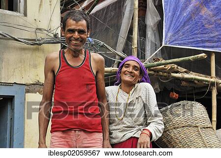 Male and female road workers, Thamel, Kathmandu, Nepal, Asia View Large Photo Image Stock Photo - Male and female road workers, Thamel, Kathmandu, Nepal, Asia. Fotosearch