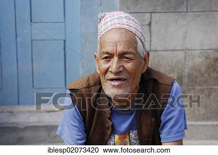 Man with traditional headwear, Bhaktapur, Kathmandu Valley, Nepal, Asia View Large Photo Image Stock Image - Man with traditional headwear, Bhaktapur, Kathmandu Valley, Nepal, Asia. Fotosearch