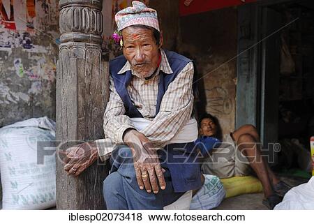 Man with traditional headwear, Bhaktapur, Kathmandu Valley, Nepal, Asia View Large Photo Image Stock Photo - Man with traditional headwear, Bhaktapur, Kathmandu Valley, Nepal, Asia. Fotosearch