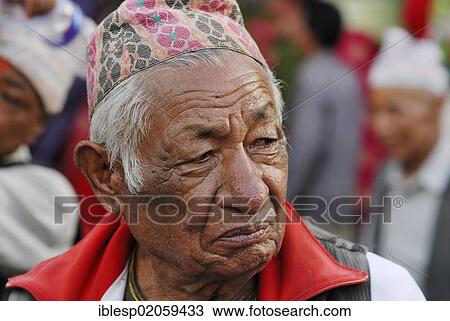 Man with traditional headwear, Taumadhi square, Bhaktapur, Kathmandu Valley, Nepal, Asia View Large Photo Image Stock Image - Man with traditional headwear, Taumadhi square, Bhaktapur, Kathmandu Valley, Nepal, Asia. Fotosearch