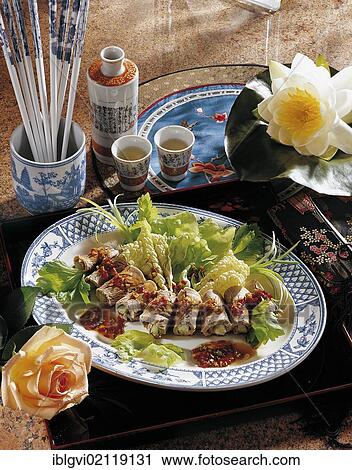 Marinated meat rolls with garlic sauce, cooked sliced pork fillet, stuffed with celery, cold starter, China, Asia View Large Photo Image Stock Image - Marinated meat rolls with garlic sauce, cooked sliced pork fillet, stuffed with celery, cold starter, China, Asia. Fotosearch