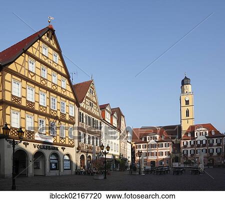 Stock Image - Market square with twin houses and the tower of the minster St. Johannes Baptist, St. John Baptist, Bad Mergentheim an der Tauber, Hohenlohe district, Baden-Wuerttemberg, Germany, Europe. Fotosearch