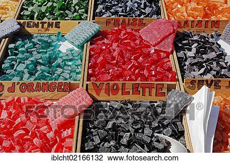 Stock Image - Market stall with various types of sweets, Sault, Vaucluse, Provence-Alpes-Cote d'Azur, Southern France, France, Europe, PublicGround, Europe. Fotosearch