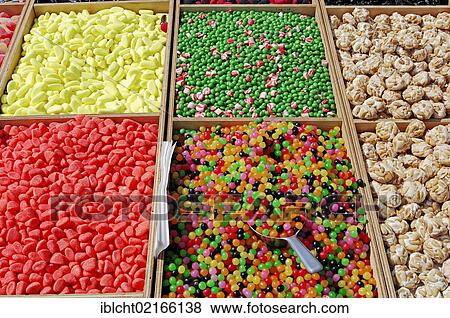 Stock Photo - Market stall with various types of sweets, Sault, Vaucluse, Provence-Alpes-Cote d'Azur, Southern France, France, Europe, PublicGround, Europe. Fotosearch