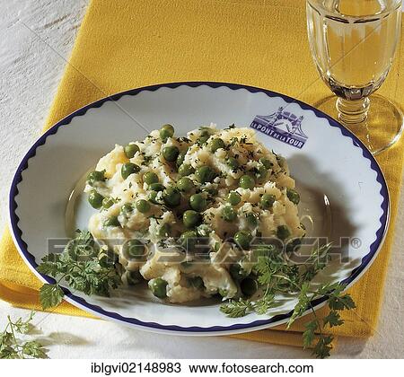 Stock Image - Mashed potatoes with peas, France, Europe. Fotosearch