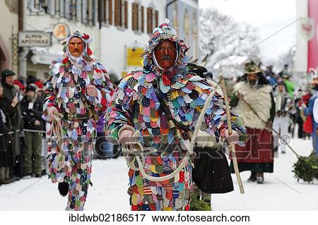 Men dressed in traditional carnival costumes, carnival parade, Maschkera, Mittenwald, Werdenfelser Land, Upper Bavaria, Germany, Europe View Large Photo Image Stock Photo - Men dressed in traditional carnival costumes, carnival parade, Maschkera, Mittenwald, Werdenfelser Land, Upper Bavaria, Germany, Europe. Fotosearch