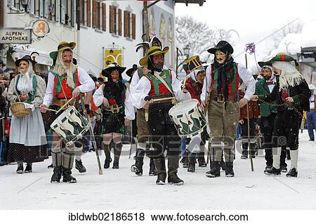 Men dressed in traditional carnival costumes, carnival parade, Maschkera, Mittenwald, Werdenfelser Land, Upper Bavaria, Germany, Europe View Large Photo Image Stock Photo - Men dressed in traditional carnival costumes, carnival parade, Maschkera, Mittenwald, Werdenfelser Land, Upper Bavaria, Germany, Europe. Fotosearch