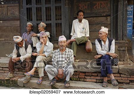 Men sitting on steps, Bhaktapur, Kathmandu Valley, Nepal, Asia View Large Photo Image Stock Photo - Men sitting on steps, Bhaktapur, Kathmandu Valley, Nepal, Asia. Fotosearch