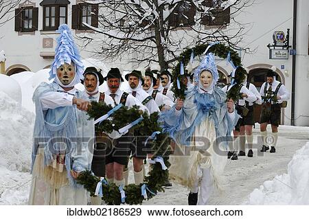 Men with bells, traditional carnival costumes, carnival parade, Maschkera, Mittenwald, Werdenfelser Land, Upper Bavaria, Germany, Europe View Large Photo Image Stock Photo - Men with bells, traditional carnival costumes, carnival parade, Maschkera, Mittenwald, Werdenfelser Land, Upper Bavaria, Germany, Europe. Fotosearch
