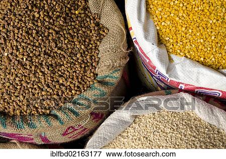 Stock Photo - Moong Dhal, Urid Dhal and other types of lentils for sale on the market in the suburb of Paharganj, New Delhi, India, Asia. Fotosearch
