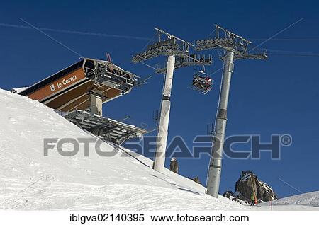 Stock Photography - Mountain station of the Le Cornu chairlift against a blue sky, Chamonix ski resort, Haute Savoie, France, Europe. Fotosearch