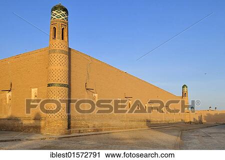 Stock Image - Muhammad Rakhim Chan Madrassah, Ichan Kala, historic adobe town of Khiva, Chiva, Silk Road, Unesco World Heritage Site, Uzbekistan, Central Asia, Asia. Fotosearch