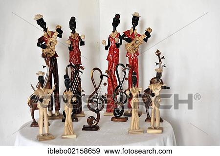 Stock Photo - Musicians, music group, carved in wood, souvenirs, Trinidad, Cuba, Greater Antilles, Caribbean, Central America, America, North America. Fotosearch