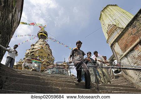 Nepalese people on stairs, Swayambhunath temple, Kathmandu, Nepal, Asia View Large Photo Image Picture - Nepalese people on stairs, Swayambhunath temple, Kathmandu, Nepal, Asia. Fotosearch